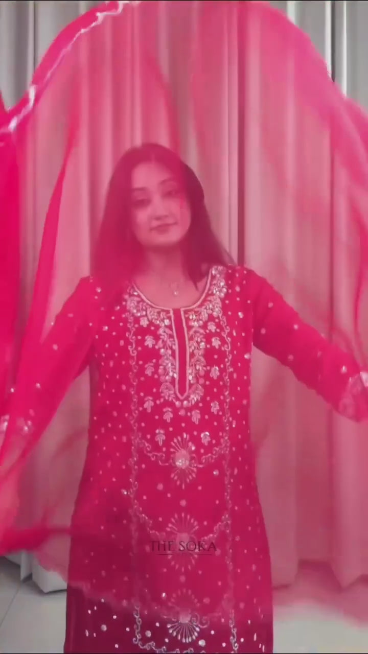 Woman wearing a red chinon sharara set 